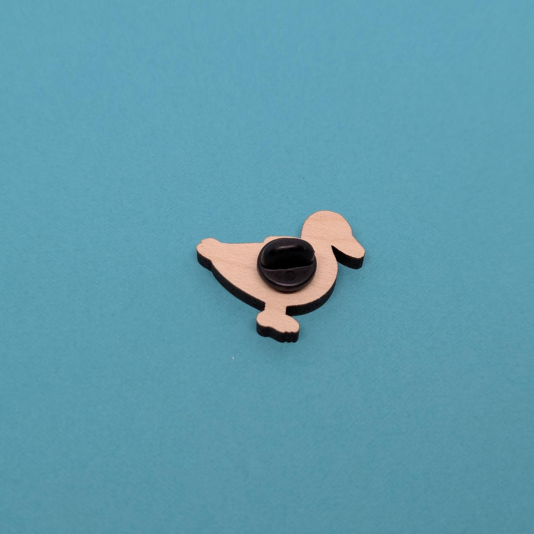back of wooden duck pin badge