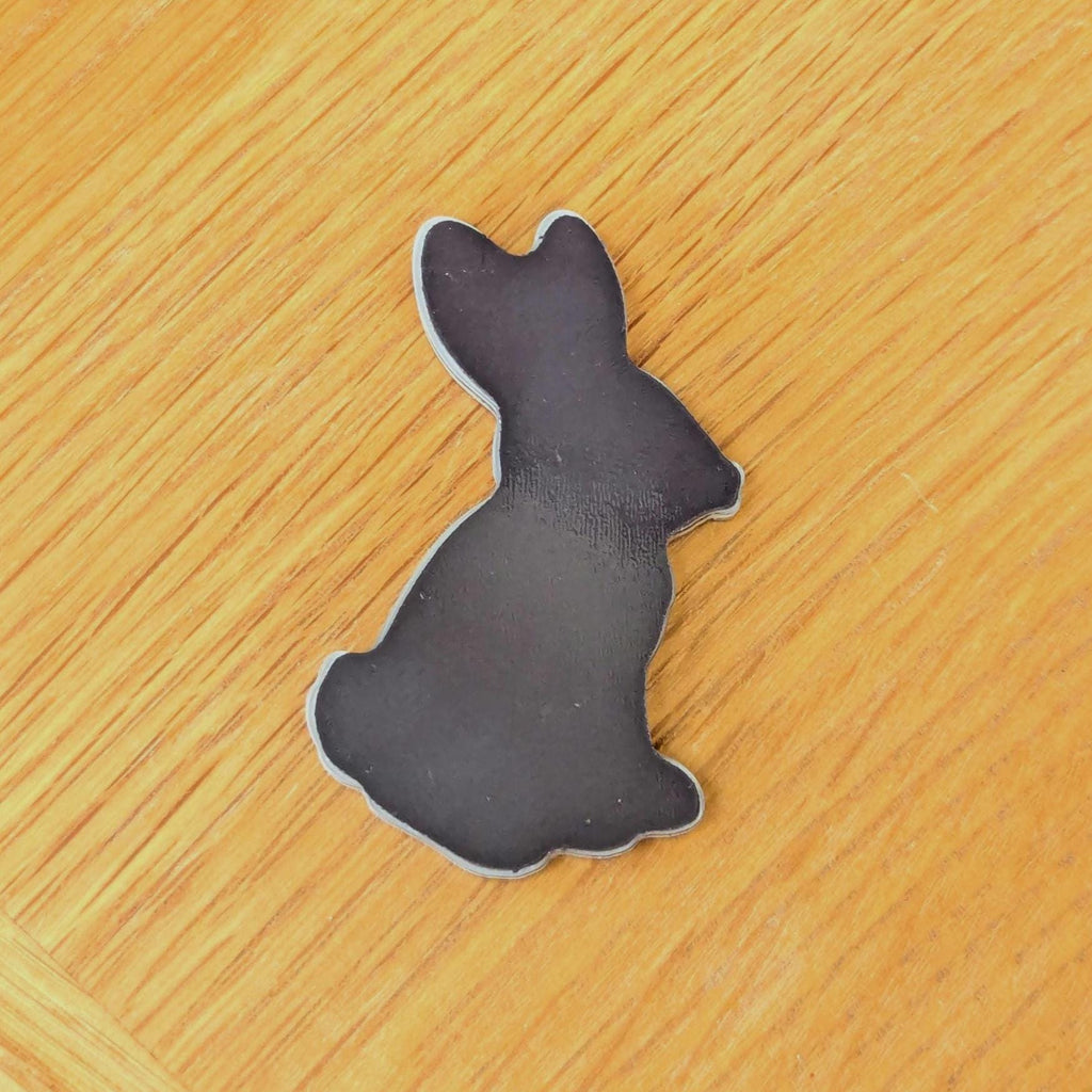 Back view of a hare fridge magnet by pin badger