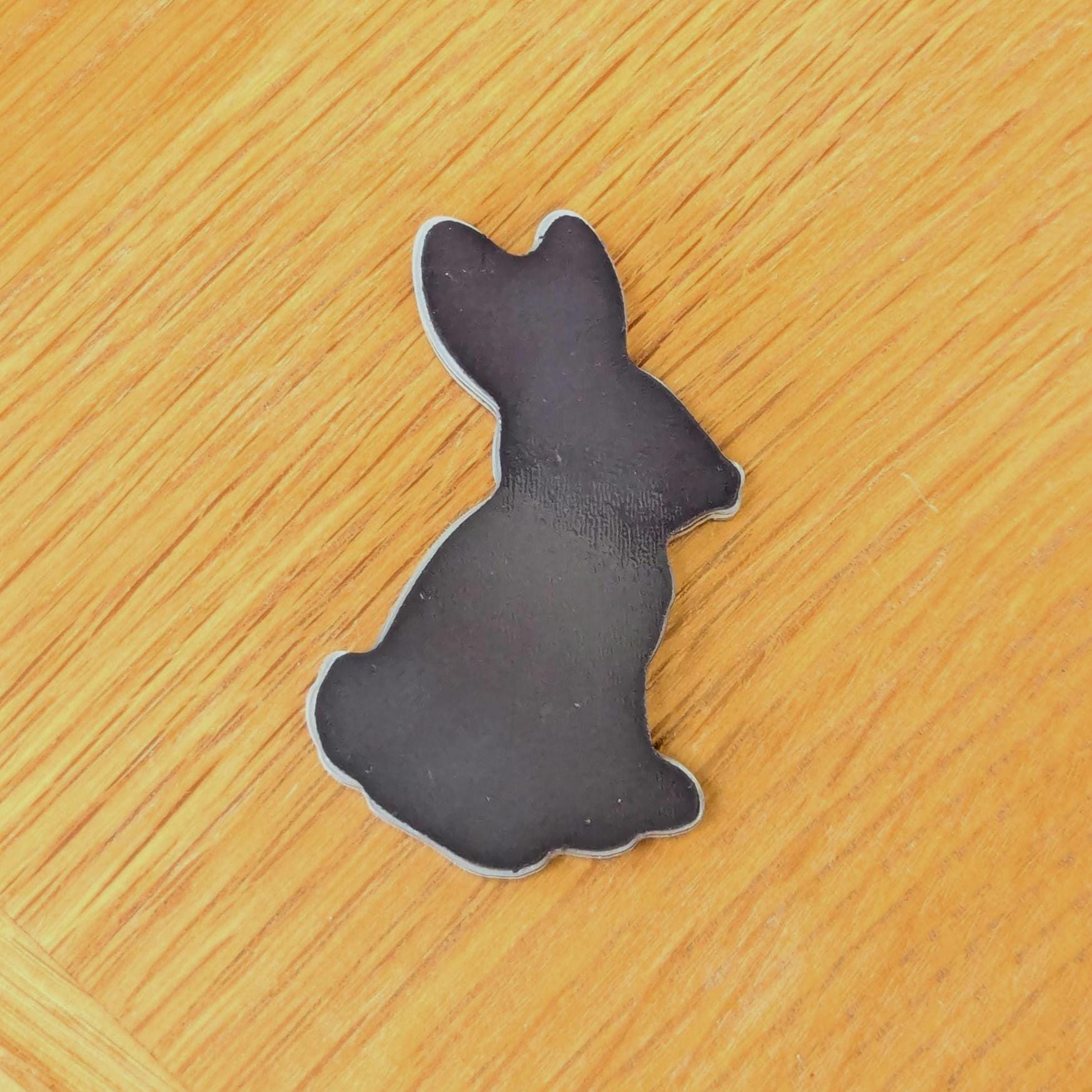 Back view of a hare fridge magnet by pin badger