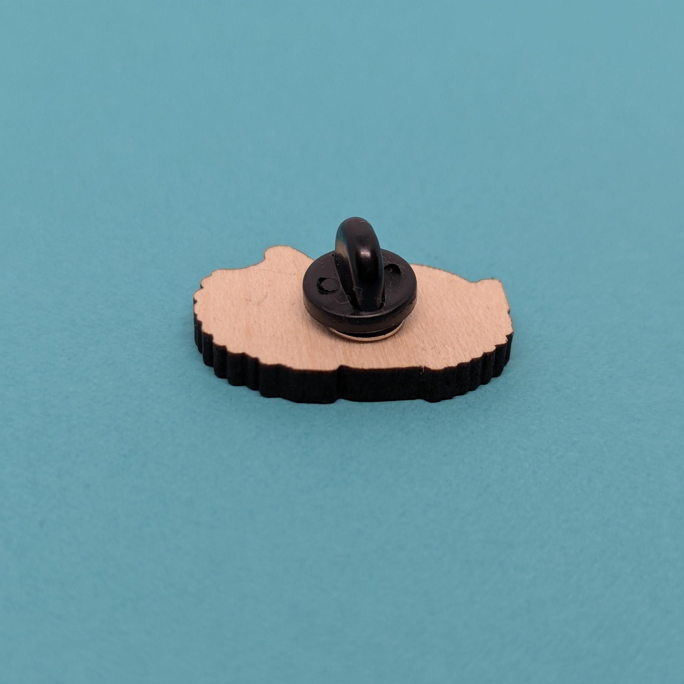 Back of hedgehog wooden pin badge