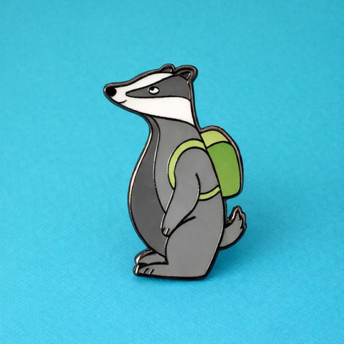 Badger with a green backpack on a blue background
