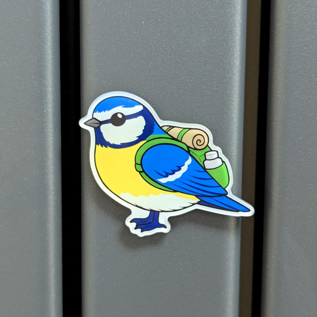 Blue tit fridge magnet on a metallic surface