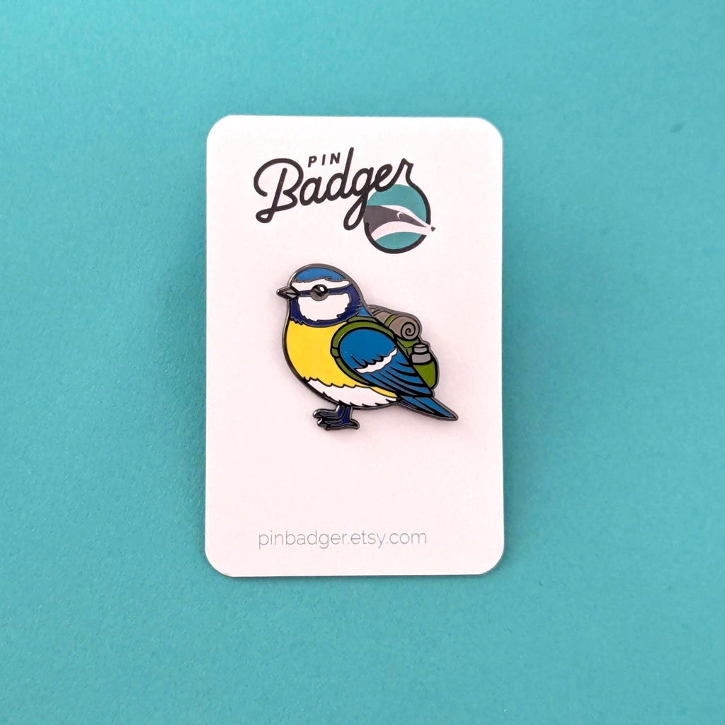 blue tit pin on a card with 'Pin Badger' branding against a teal background