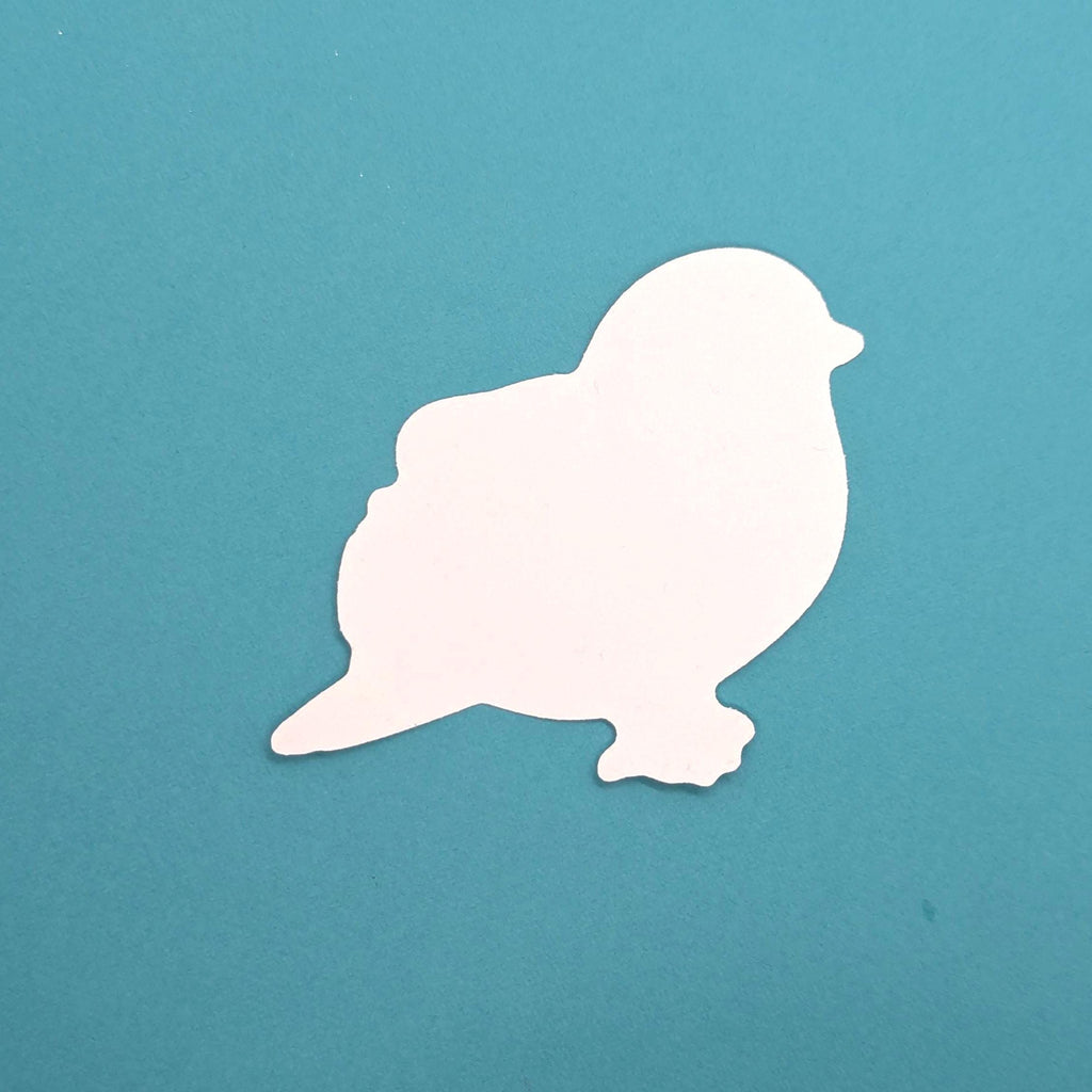 Back view of blue tit sticker on a teal background