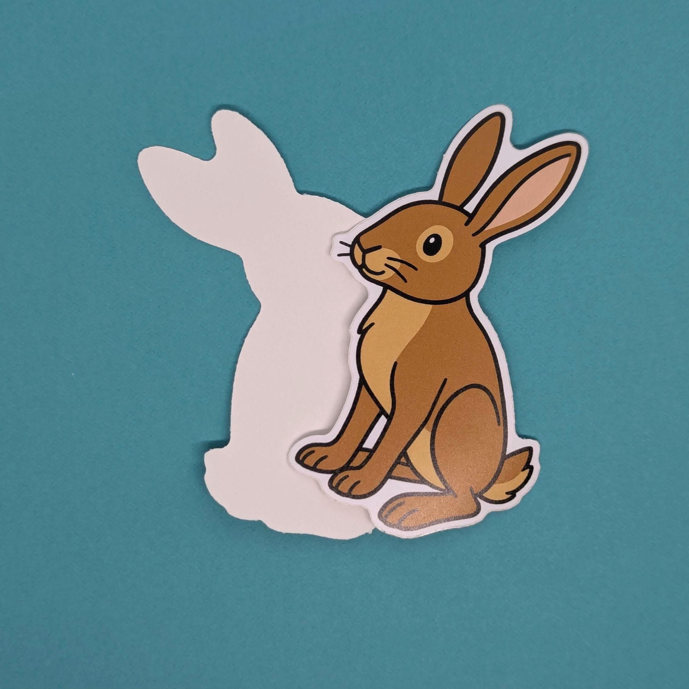 Cartoon-style brown hare vinyl sticker on a teal background