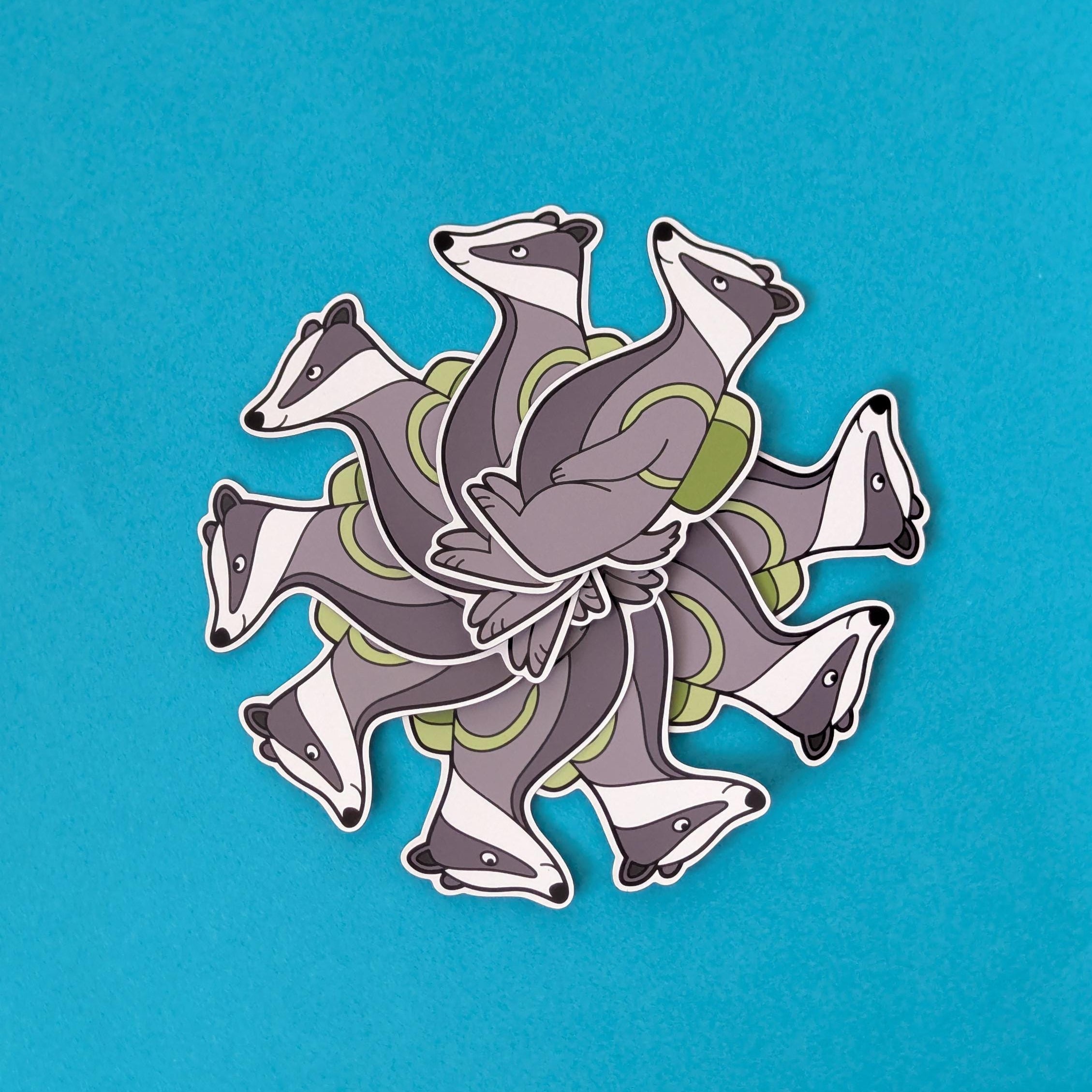 Decorative magnets with badger design on a blue background