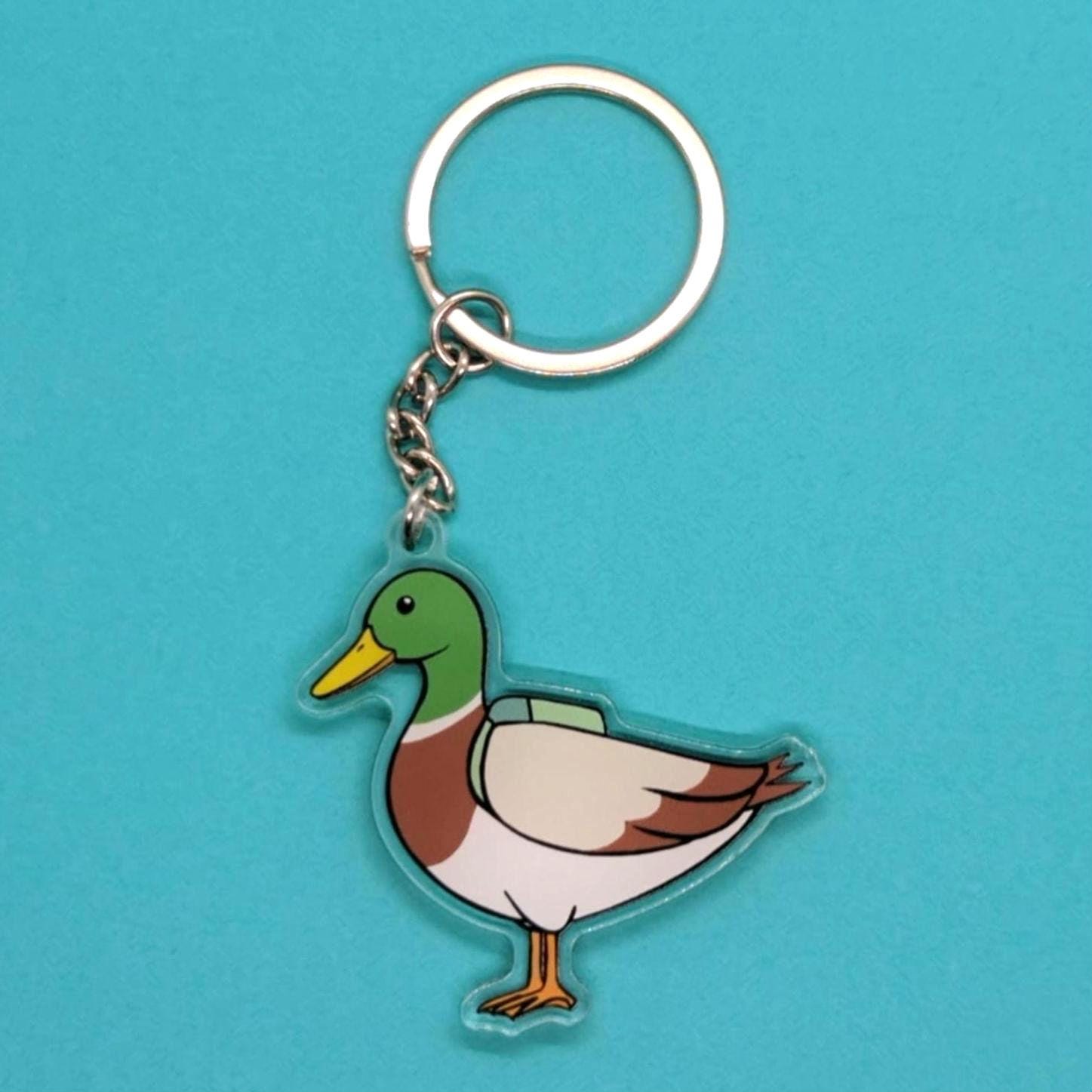 duck keyring on a blue background