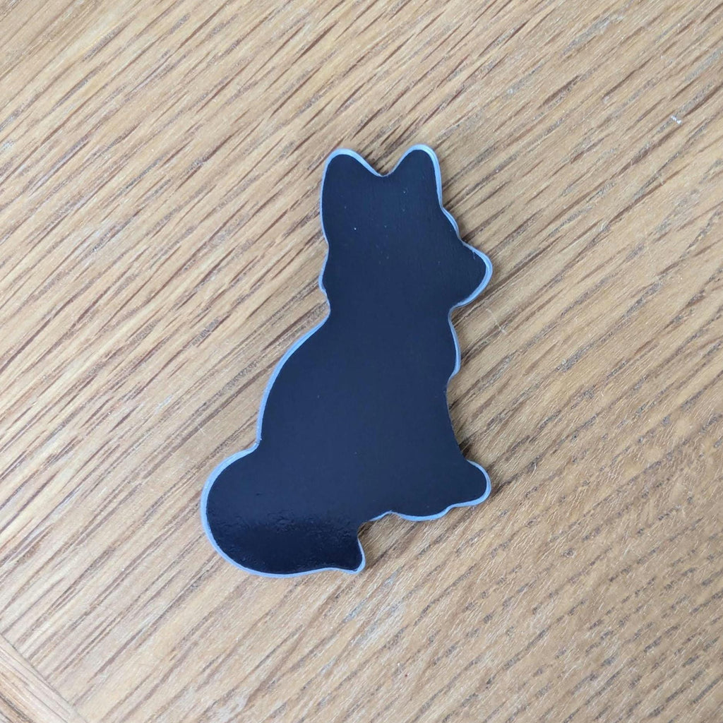 back of red fox fridge magnet