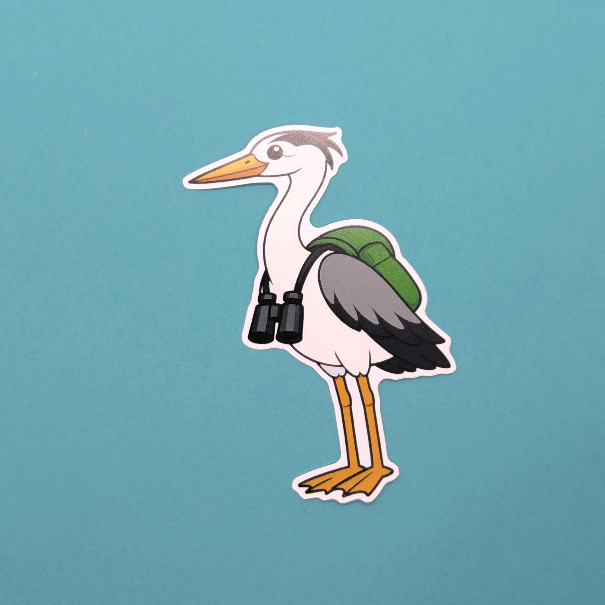 Cartoon heron with a camera and green backpack on a teal background