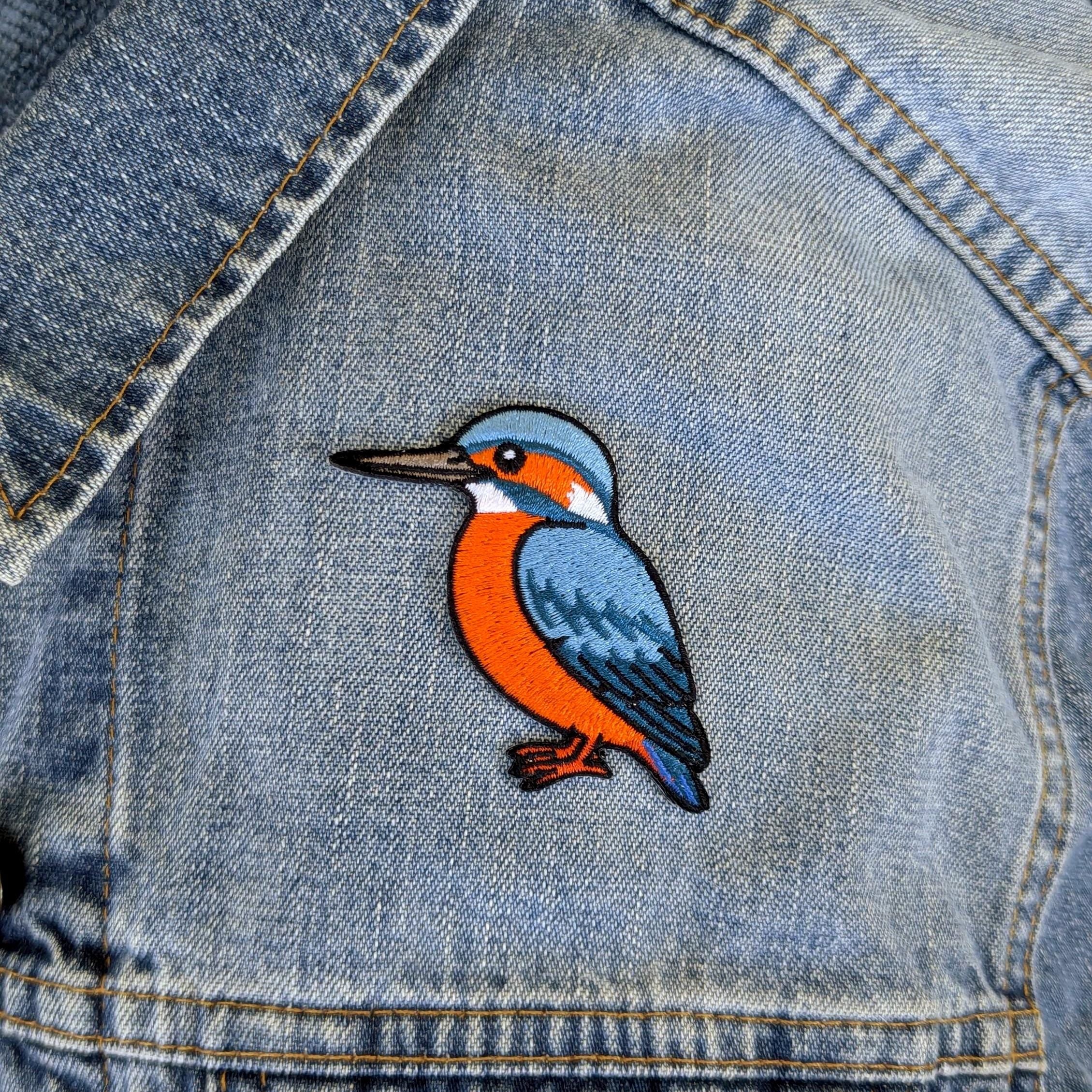 Kingfisher bird patch on a denim jacket