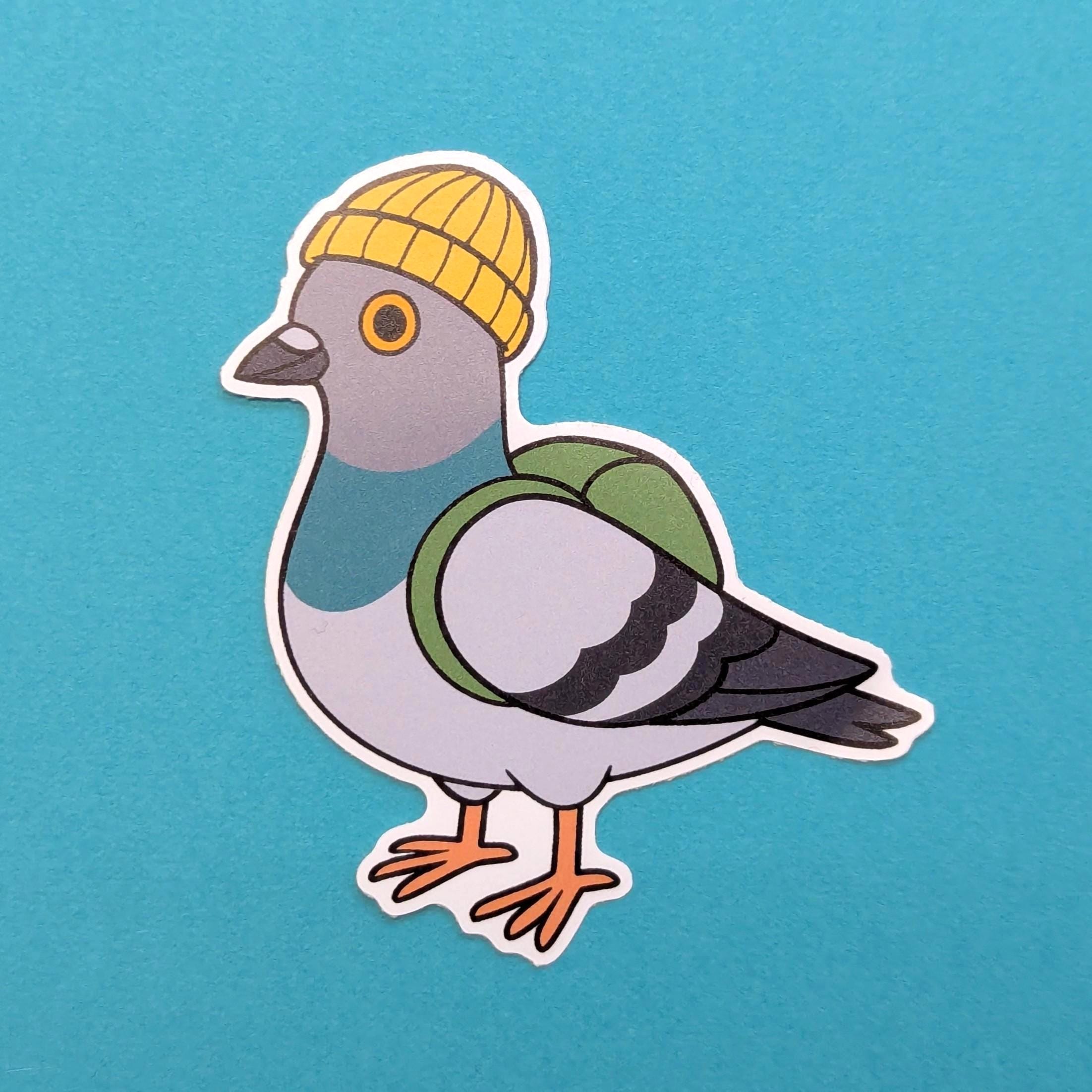 Sticker of a cartoon pigeon wearing a yellow beanie