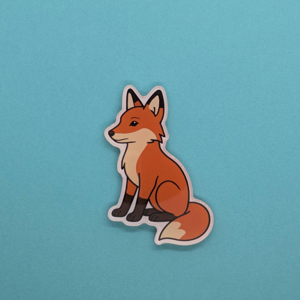 fridge magnet of red fox on a blue background
