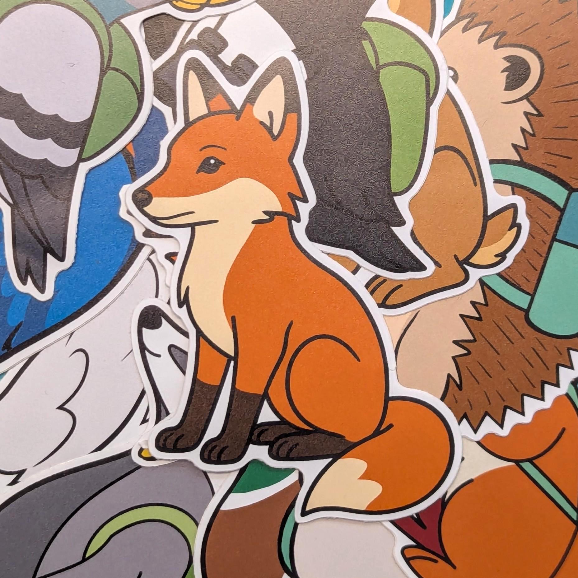 Sticker of a fox among other animal stickers by pin badger on a textured background
