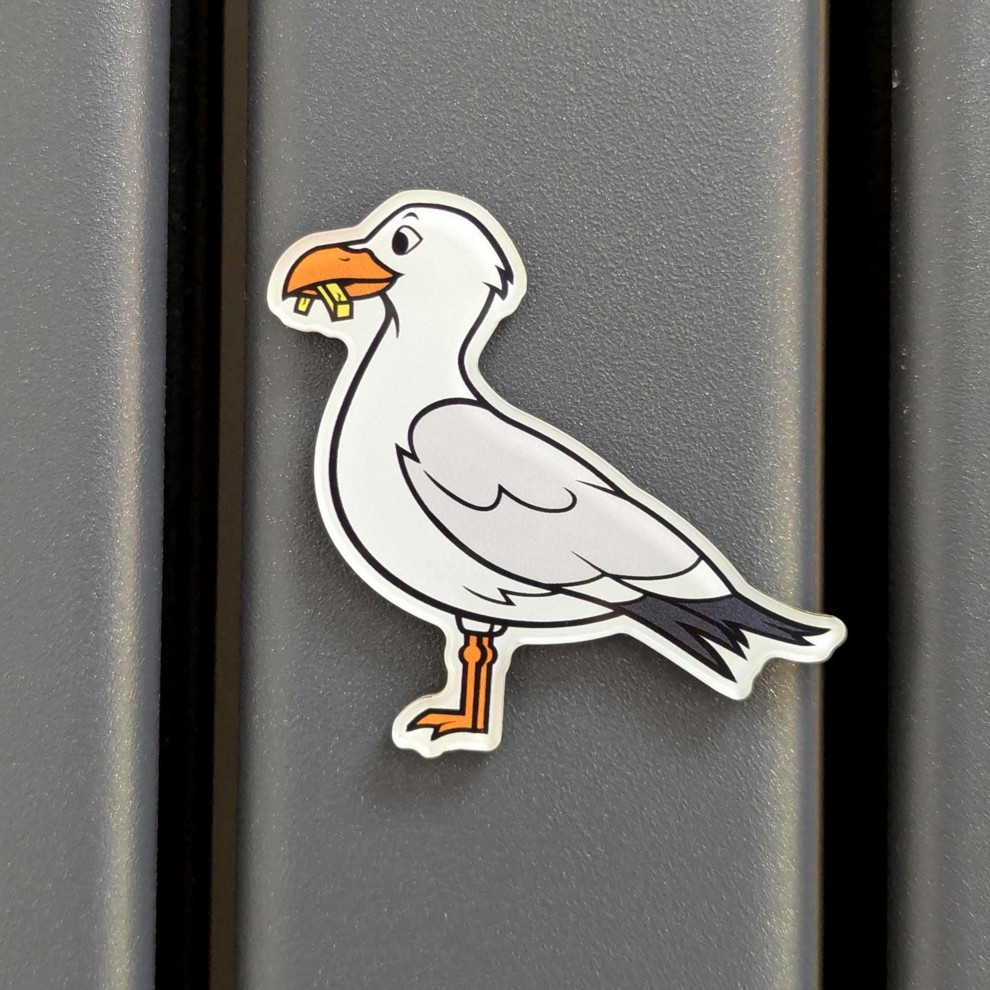 seagull fridge magnet on a grey background