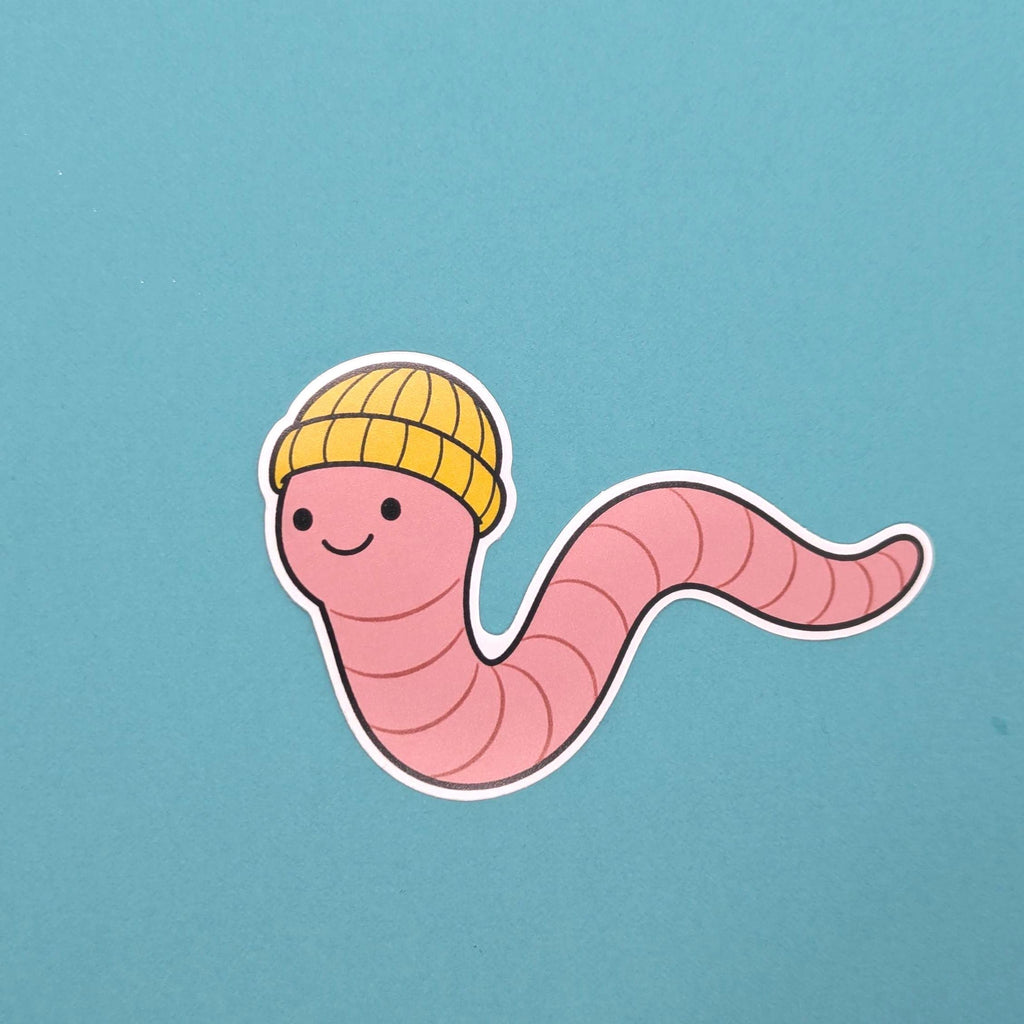 Cartoon worm wearing a yellow beanie on a blue background